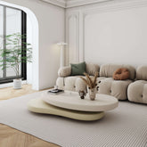 Off-white and beige minimalist rotatable coffee table with unique oval design